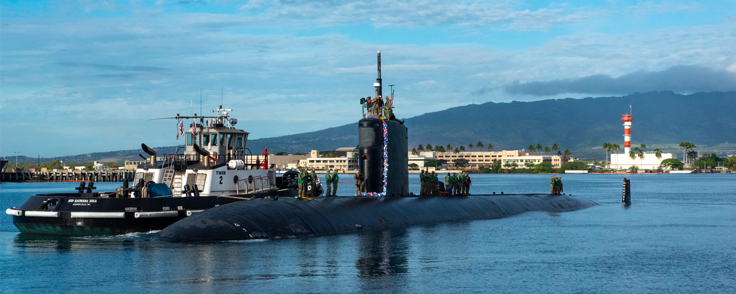 PEARL HARBOR, Hawaii (Dec. 15, 2020) - The Los Angeles-class fast-attack submarine USS Topeka (SSN 754) arrives in Pearl Harbor, Hawaii, after completing a change of homeport from Guam, Dec. 15. Topeka’s ability to support a multitude of missions, including anti-submarine warfare, anti-surface ship warfare, strike warfare, surveillance and reconnaissance, has made Topeka one of the most capable submarines in the world. (U.S. Navy Photo by Lorilyn Cravalho/Released) 