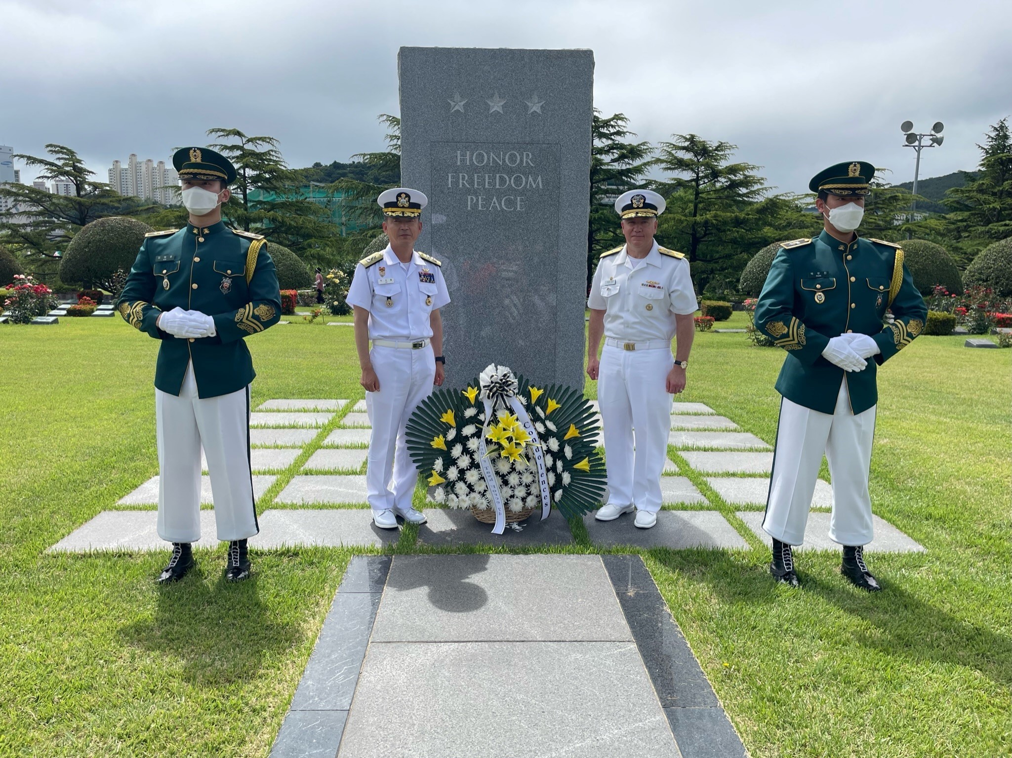 BUSAN, Republic of Korea (June 21, 2022) Rear Adm. Rick Seif, Commander, Submarine Group 7, right, and Rear Adm. Lee Su Youl, Commander, Republic of Korea (ROK) Navy Submarine Force, place a wreath at the United Nations Memorial Cemetery in Korea (UNMCK) in honor of those UN Forces that gave their lives for world peace and freedom, June 21, 2022. The UNMCK, where more than 2,300 service members from 16 countries have been interred, is the only United Nations cemetery in the world, and the final resting place for United Nations Command (UNC) veterans of the Korean War. Seif visited UNMCK as part of his trip to Korea for the 54th Submarine Warfare Committee Meeting (SWCM). (Photo courtesy of Lt. Haley Bonner) 