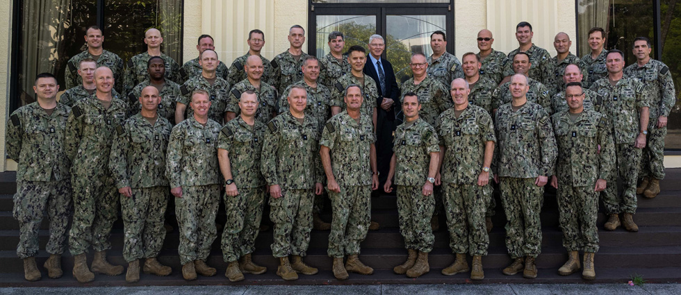 JOINT BASE PEARL HARBOR-HICKAM (Oct. 25, 2022) -- Rear Adm. Jeff Jablon, Commander, Submarine Force, U.S. Pacific Fleet, bottom row, center, poses for a photo with submarine force leadership in front of Lockwood Hall during Group and Major Commanders’ Officer Training Symposium (GAMCOTS), Oct. 25. (U.S. Navy photo by Electronics Technician 2nd Class Leland T. Hasty II) 