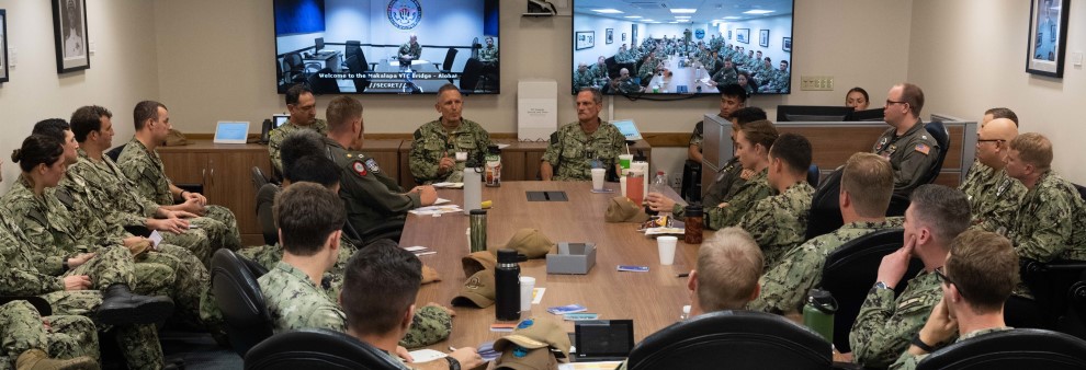 PEARL HARBOR (November 17, 2022) — Rear Adm. Michael Vernazza, Commander, Fleet Information Warfare Command/Information Warfare Task Force Pacific, addresses a group of junior officers at a flag officer panel held during the inaugural Commander, Submarine Force U.S. Pacific Fleet Junior Officer Undersea Symposium and Training (JOUST) event, Nov. 17, 2022. Pacific JOUST is an all-community event, planned and executed by junior officers to develop the U.S. Navy's future undersea warfare leaders. (Badges blurred for security purposes).