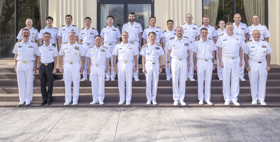 230413-N-EI510-0048 JOINT BASE PEARL HARBOR-HICKAM (April 13, 2023) Attendees of the Submarine Warfare Commanders Conference (SWCC) pose for a group photo on Joint Base Pearl Harbor-Hickam, Hawaii, April 13, 2023. The purpose of SWCC, which was first held in 2018, is to strengthen a free and open Indo-Pacific region through expanded cooperation between submarine force commanders of allies and partners. (U.S. Navy photo by Mass Communication Specialist 1st Class Scott Barnes)