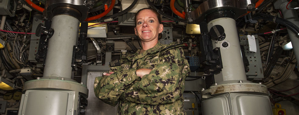 220826-N-ED185-1010 NAVAL BASE KITSAP – BREMERTON, Wash. (Aug. 26, 2022) U.S. Navy Master Chief Information Systems Technician Angela Koogler poses for an environmental portrait aboard the Ohio-class ballistic missile submarine USS Louisiana (SSBN 743). Koogler is the Navy’s first female chief of the boat. (U.S. Navy photo by Mass Communication Specialist 1st Class Brian G. Reynolds)
