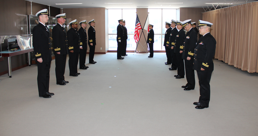 YOKOSUKA, Japan (April 10, 2023) Leadership from Japan Maritime Self-Defense Force (JMSDF) Fleet Submarine Force and Commander, Submarine Group 7/Task Force 74 stand at attention during a ceremony held at JMSDF’s Funakoshi Fleet headquarters in Yokosuka, Japan, April 10. Submarine Group 7 directs forward-deployed, combat-capable forces across the full spectrum of undersea warfare throughout the Western Pacific, Indian Ocean, and Arabian Sea. (Photo courtesy of JMSDF Public Affairs)