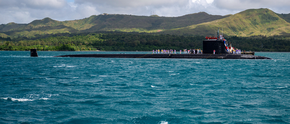 241126-N-VC599-1007 The Virginia-class fast attack submarine USS Minnesota (SSN 783) arrives at U.S. Naval Base Guam, Nov 26, 2024. Minnesota, the first Virginia-class fast-attack submarine to be forward deployed to Guam, joins four Los Angeles-class fast-attack submarines forward deployed in the Pacific. Regarded as apex predators of the sea, Guam's fast-attack submarines serve at the tip of the spear, helping to reaffirm the submarine forces' forward-deployed presence in support of a free and open Indo-Pacific. (U.S. Navy photo by Mass Communication Specialist 1st Class Justin Wolpert)