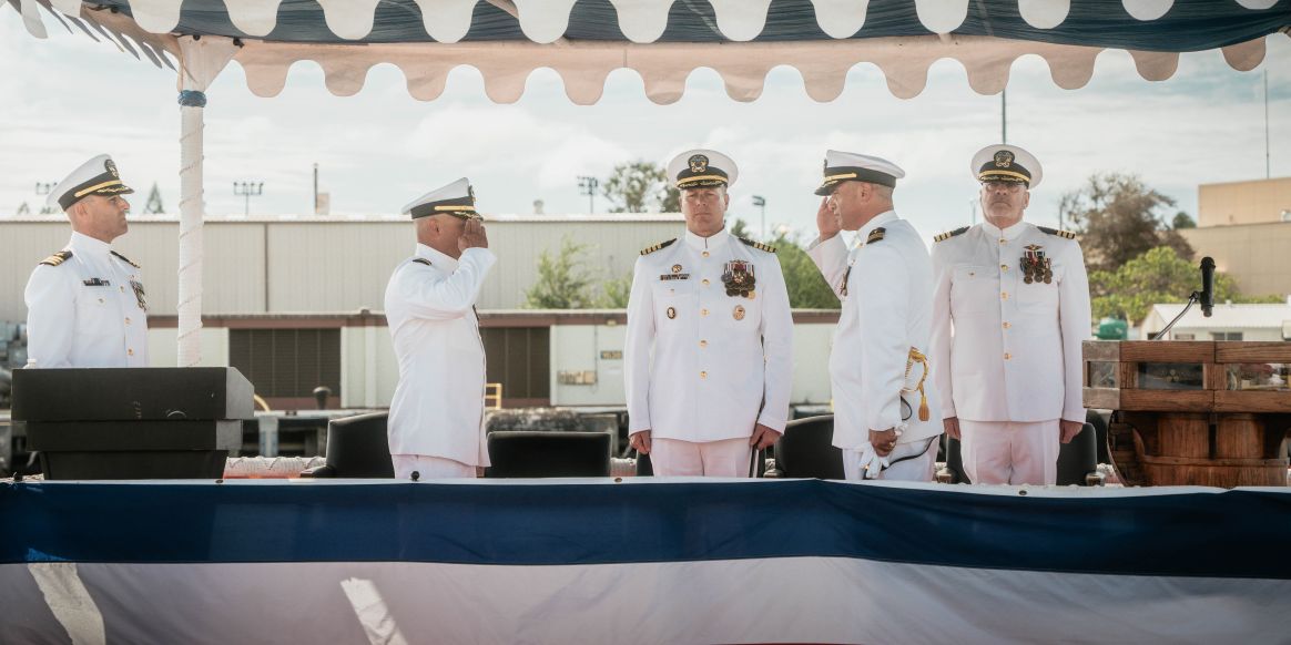 JOINT BASE PEARL HARBOR-HICKAM, Hawaii (Nov. 19, 2025) - Cmdr. Michael Humara, commanding officer of Virginia-class fast-attack submarine USS Missouri (SSN 780), departs the change of command ceremony for Missouri at Joint Base Pearl Harbor-Hickam, Hawaii, Nov. 19, 2025. Missouri is assigned to Submarine Squadron 7 and is capable of supporting various missions, including anti-submarine warfare, anti-surface ship warfare, strike warfare, special operations forces support, and intelligence, surveillance, and reconnaissance. (U.S. Navy photo by Mass Communication Specialist 2nd Class Nicholas Russell)