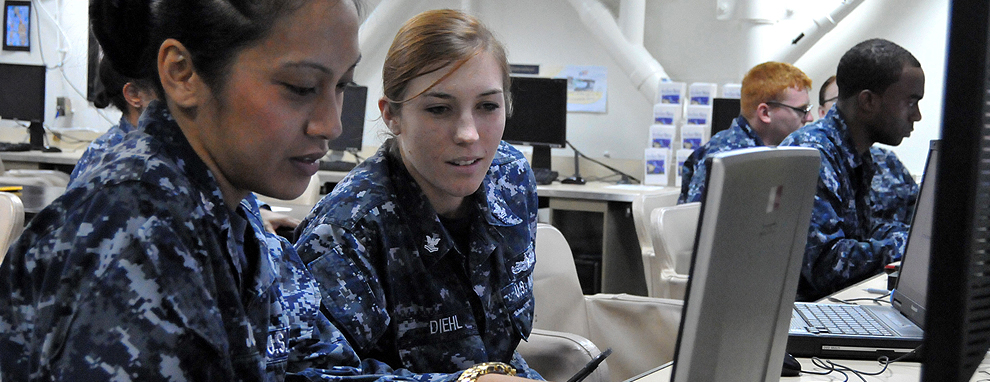 Sailors at a laptop computer